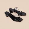 Black patent leather sandal for women featuring elegant straps and comfortable low block heels by DayLife Leather.