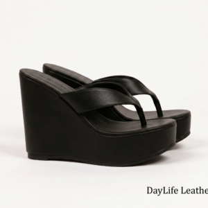 DayLife Leather Premium Black Platform Wedge Sandals Close-up shot of DayLife Leather black platform wedge sandals with thong-style straps, displayed on a clean white background, showcasing premium craftsmanship available at DayLifeLeather.com.