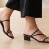 Black patent leather sandal for women featuring elegant straps and comfortable low block heels by DayLife Leather.