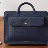 Premium genuine leather bag for business professionals. A luxury blue leather office bag with dual handles and gold DayLife Leather signature details.