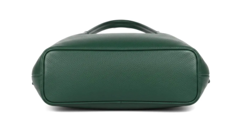 Daylife Leather deep green pebble grain leather hobo shoulder bag with a front pocket holding a smartphone on a wooden table.