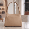A high-quality full-grain beige leather shoulder bag from DayLife Leather