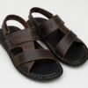 Multiple viewing angles of men's handcrafted dark brown leather casual sandals showcasing dual straps, contrast stitching, and a comfortable flat sole.