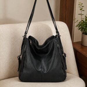Handcrafted Black Leather Convertible Shoulder Bag and Backpack Handcrafted black leather convertible shoulder bag and backpack with multi-pocket design