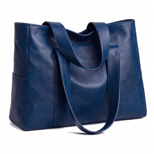 Navy blue handcrafted leather tote bag with sturdy shoulder straps and side pockets on a display stand. Navy blue handcrafted leather tote bag with sturdy shoulder straps and side pockets on a display stand.