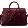 Back view of DayLifeLeather handcrafted maroon textured leather briefcase bag with shoulder strap on a white background.