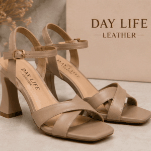 DayLife Leather premium nude color criss cross strappy block heel sandals for women next to its brand packaging box