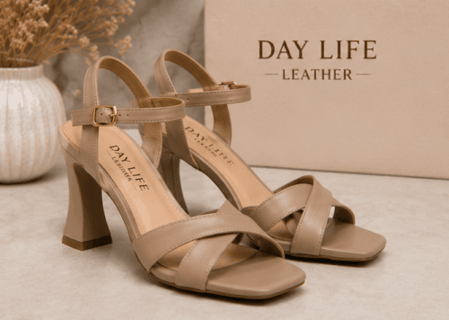 DayLife Leather premium nude color criss cross strappy block heel sandals for women next to its brand packaging box