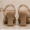DayLife Leather premium nude color criss cross strappy block heel sandals for women next to its brand packaging box