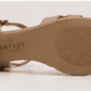 DayLife Leather premium nude color criss cross strappy block heel sandals for women next to its brand packaging box