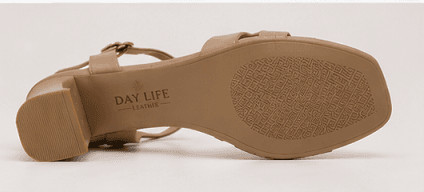 DayLife Leather premium nude color criss cross strappy block heel sandals for women next to its brand packaging box