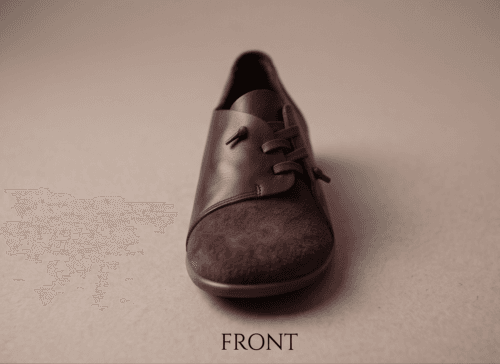 Dark brown leather and suede lace-up shoes for women, close-up texture view