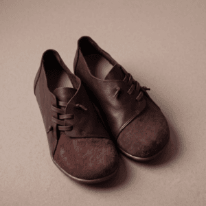 Dark Brown Leather & Suede Lace-Up Shoes – Lookbook Texture View Dark brown leather and suede lace-up shoes for women, close-up texture view