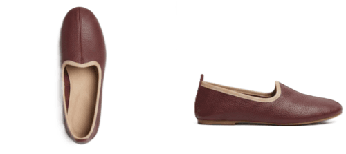 Men's maroon leather juti slip-on shoes with beige piping and suede-lined interior, side view