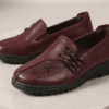 Top view of men's burgundy leather loafers with handcrafted knotted bow detail