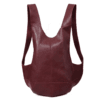 DayLife Leather handcrafted maroon ergonomic leather backpack worn by a female model on an urban street