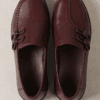 Top view of men's burgundy leather loafers with handcrafted knotted bow detail