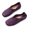 A product photography composite image showing a pair of handcrafted deep purple, pebbled leather flat shoes arranged in three views on a light gray background. The left panel shows the top-down (upper) view, the center panel shows the side profile, and the right panel shows the rear (back) view.