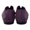 A product photography composite image showing a pair of handcrafted deep purple, pebbled leather flat shoes arranged in three views on a light gray background. The left panel shows the top-down (upper) view, the center panel shows the side profile, and the right panel shows the rear (back) view.