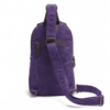 Male model wearing a vintage purple waxed canvas crossbody sling backpack by Daylife Leather on an urban cobblestone street, featuring product close-up and open interior view.