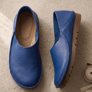 Men's Navy Blue Leather Slip-On Shoes with Sock Collar Men's navy blue pebbled leather slip-on shoes with beige ribbed sock-style collar and brown rubber sole