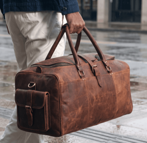 Brown genuine leather travel backpack with detachable shoulder strap